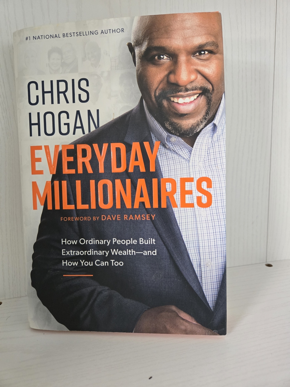 Everyday Millionaires Book - Orange & White Cover by Chris Hogan